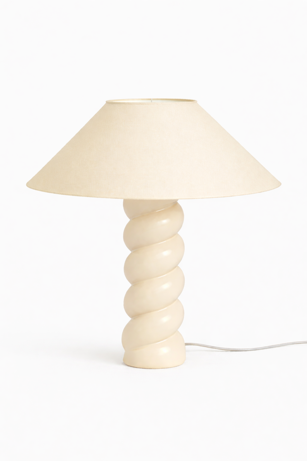 White table lamp with a spiral base on a white background